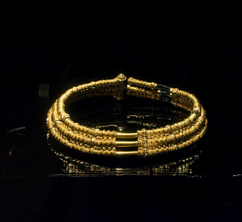 A gold object displayed in the museum collection